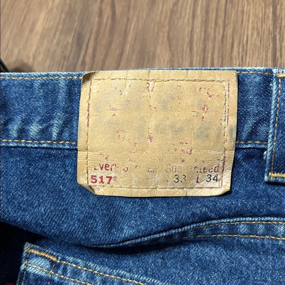 VTG Levi’s 517 Bootcut Jeans Made in USA 33x34 Red Tab Distressed Hem